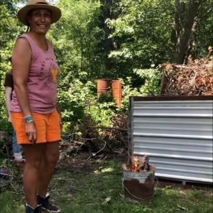 Julie Vanderhoop with the kiln at Orange Peel bakery in 2024.