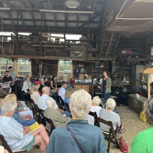 Maggie discusses biochar at a book launch at Gannon and Benjamin in 2025.